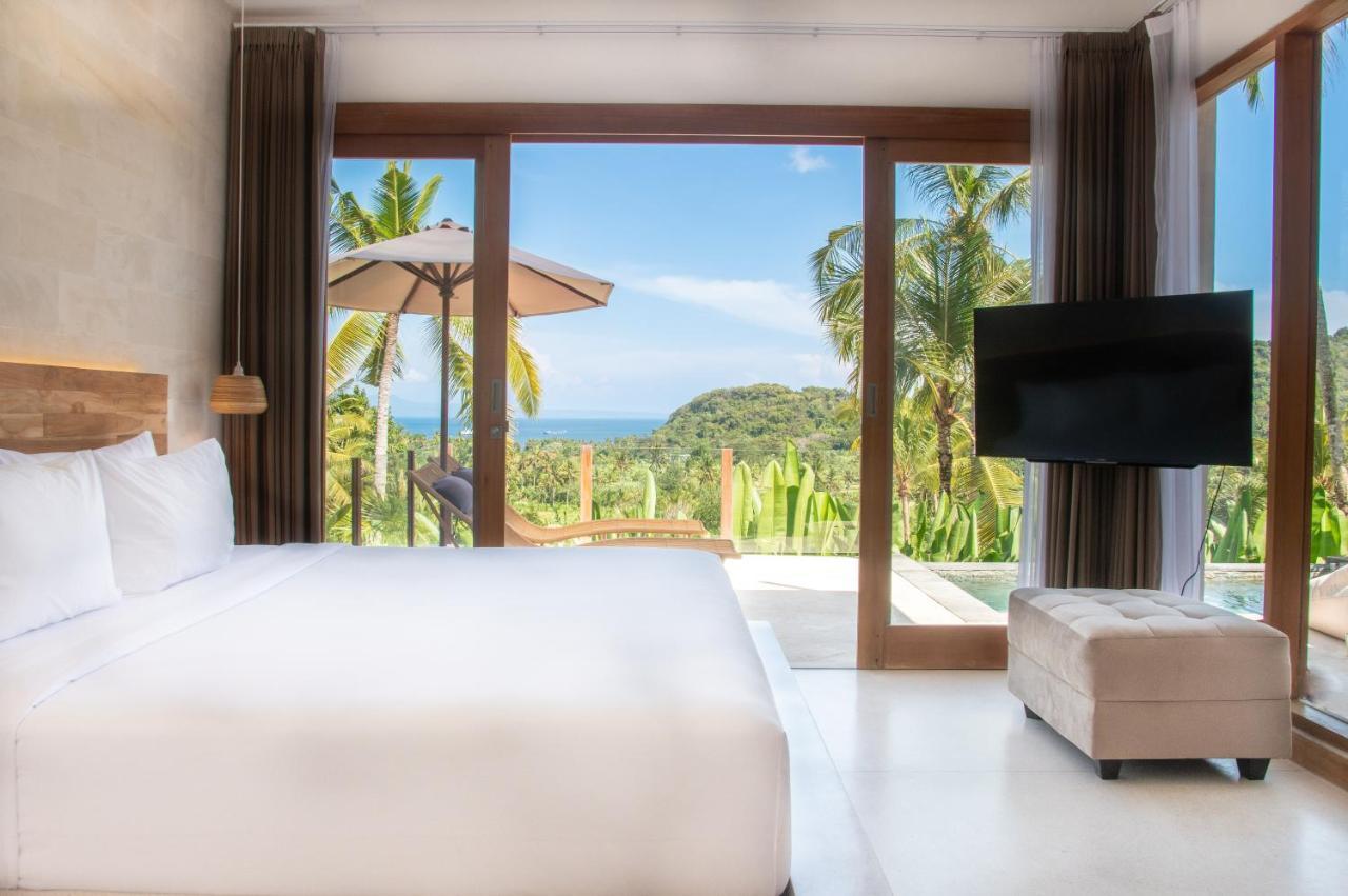 Neano Escape Hotel Manggis Kültér fotó A bedroom at the resort